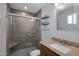 Modern bathroom with granite vanity and large shower at 2543 E Manhatton Dr, Tempe, AZ 85282