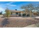 House exterior featuring a well-maintained lawn and a two-car garage at 2543 E Manhatton Dr, Tempe, AZ 85282