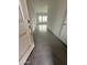 An entryway with gray, rectangular tile and white walls at 25519 W Brookhart Way, Wittmann, AZ 85361