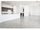 Open kitchen features stainless appliances, granite countertops, and center island at 25519 W Brookhart Way, Wittmann, AZ 85361
