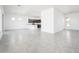 Spacious living room boasts tile floors and an open floorplan at 25519 W Brookhart Way, Wittmann, AZ 85361