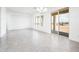 Bright living area with sliding glass doors that lead to the backyard at 25519 W Brookhart Way, Wittmann, AZ 85361