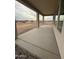 Covered patio with view of the vacant lot at 25519 W Brookhart Way, Wittmann, AZ 85361