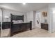 Main bedroom features a dark wood bed frame and ample floor space at 2602 W Roeser Rd, Phoenix, AZ 85041