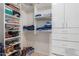 Walk-in closet with shelving and drawers for storage at 2602 W Roeser Rd, Phoenix, AZ 85041