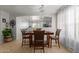 Dining area features a wooden table with four chairs, and an open layout at 2602 W Roeser Rd, Phoenix, AZ 85041