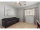 Cozy living room featuring a sofa and large piece of art at 2602 W Roeser Rd, Phoenix, AZ 85041