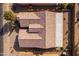 Aerial view of a house's roof and backyard, highlighting its design and outdoor space at 2629 E Santa Maria Dr, Casa Grande, AZ 85194