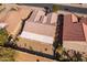 Aerial view of a house's roof and backyard, highlighting its design and outdoor space at 2629 E Santa Maria Dr, Casa Grande, AZ 85194