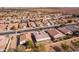 Aerial view showcasing a house's backyard and surrounding homes in a residential area at 2629 E Santa Maria Dr, Casa Grande, AZ 85194