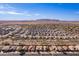 Aerial view of a residential area showcasing numerous houses and surrounding landscape at 2629 E Santa Maria Dr, Casa Grande, AZ 85194