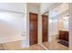 Bathroom with bathtub, shower, and mirrored closet at 2629 E Santa Maria Dr, Casa Grande, AZ 85194