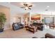 Spacious living room featuring two leather sofas and a large coffee table at 2629 E Santa Maria Dr, Casa Grande, AZ 85194