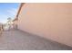 Landscaped side yard with gravel and a gated entrance at 2629 E Santa Maria Dr, Casa Grande, AZ 85194