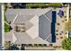 Overhead view of a house with a unique roofline, surrounded by other homes at 2952 E Warbler Rd, Gilbert, AZ 85297