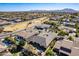 Aerial view of a luxury home with pool and park nearby at 2952 E Warbler Rd, Gilbert, AZ 85297