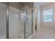 Clean bathroom with a walk-in shower and updated fixtures at 2952 E Warbler Rd, Gilbert, AZ 85297