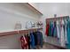 Well-organized closet with hanging rods and shelves at 2952 E Warbler Rd, Gilbert, AZ 85297