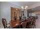 Formal dining room with a wood table and six chairs at 2952 E Warbler Rd, Gilbert, AZ 85297