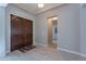 Bright and airy entryway with wood flooring and double doors at 2952 E Warbler Rd, Gilbert, AZ 85297