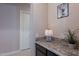 Bright entryway with granite countertop and decorative vase, welcoming guests into the home at 2952 E Warbler Rd, Gilbert, AZ 85297