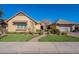 Beautiful single-story home with a landscaped yard and two-car garage at 2952 E Warbler Rd, Gilbert, AZ 85297