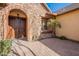 Inviting front entrance with double doors and stone accents at 2952 E Warbler Rd, Gilbert, AZ 85297