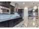 Modern kitchen with stainless steel appliances and granite countertops at 2952 E Warbler Rd, Gilbert, AZ 85297