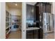 Walk-in pantry with ample shelving for storage at 2952 E Warbler Rd, Gilbert, AZ 85297