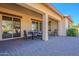 Covered patio with seating area, perfect for outdoor dining and relaxation at 2952 E Warbler Rd, Gilbert, AZ 85297