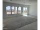 View of light and airy living room with recessed lighting and tile flooring at 29577 N 220Th Ave, Wittmann, AZ 85361