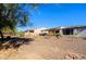 Spacious backyard with gravel and desert plants at 3020 N 165Th Ave, Goodyear, AZ 85395