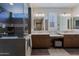 Elegant bathroom with dual vanities, quartz countertops and large walk in shower at 3020 N 165Th Ave, Goodyear, AZ 85395