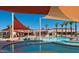 Large resort-style pool with shade structures and a spa at 3020 N 165Th Ave, Goodyear, AZ 85395