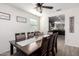 Bright dining room with a wooden table and six chairs at 30358 N Juniper Dr, Florence, AZ 85132