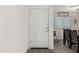 White door entryway with wood flooring and a view of the dining room at 30358 N Juniper Dr, Florence, AZ 85132