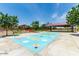 Community playground with covered pavilion and play structures at 30358 N Juniper Dr, Florence, AZ 85132