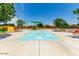 Community playground with colorful play area and shaded seating at 30358 N Juniper Dr, Florence, AZ 85132