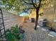 Backyard with grill, brick wall, and desert landscaping at 31655 N 131St Ave, Peoria, AZ 85383