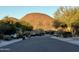 Residential street view with mountain backdrop at 31655 N 131St Ave, Peoria, AZ 85383