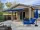 Covered patio with seating and retractable awning at 31655 N 131St Ave, Peoria, AZ 85383