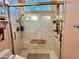 Walk-in shower with built-in seat and grab bars at 31655 N 131St Ave, Peoria, AZ 85383