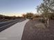 Neighborhood path and street view with desert landscaping at 31655 N 131St Ave, Peoria, AZ 85383