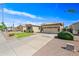 Charming single-story home with desert landscaping, a two-car garage, and a cozy curb appeal at 3383 E Santa Fe Ln, Gilbert, AZ 85297