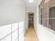 Bright hallway with tile floors and a view to the outside through a large window at 3383 E Santa Fe Ln, Gilbert, AZ 85297