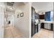 Kitchen with stainless steel appliances and dark wood cabinets at 3383 E Santa Fe Ln, Gilbert, AZ 85297