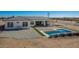 Single-story home with tile roof, pool, and patio, on a spacious lot at 34150 W Corleone Dr, Maricopa, AZ 85138