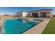 Luxury pool with spa and adjacent patio at 34150 W Corleone Dr, Maricopa, AZ 85138