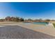 Large rectangular pool with a stone patio at 34150 W Corleone Dr, Maricopa, AZ 85138