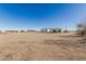 Large lot with a single-story home and plenty of space at 34150 W Corleone Dr, Maricopa, AZ 85138